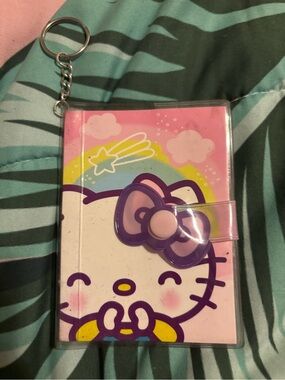 Hello Kitty Pink Purple Rainbow Keychain notepad. Wallet sized.